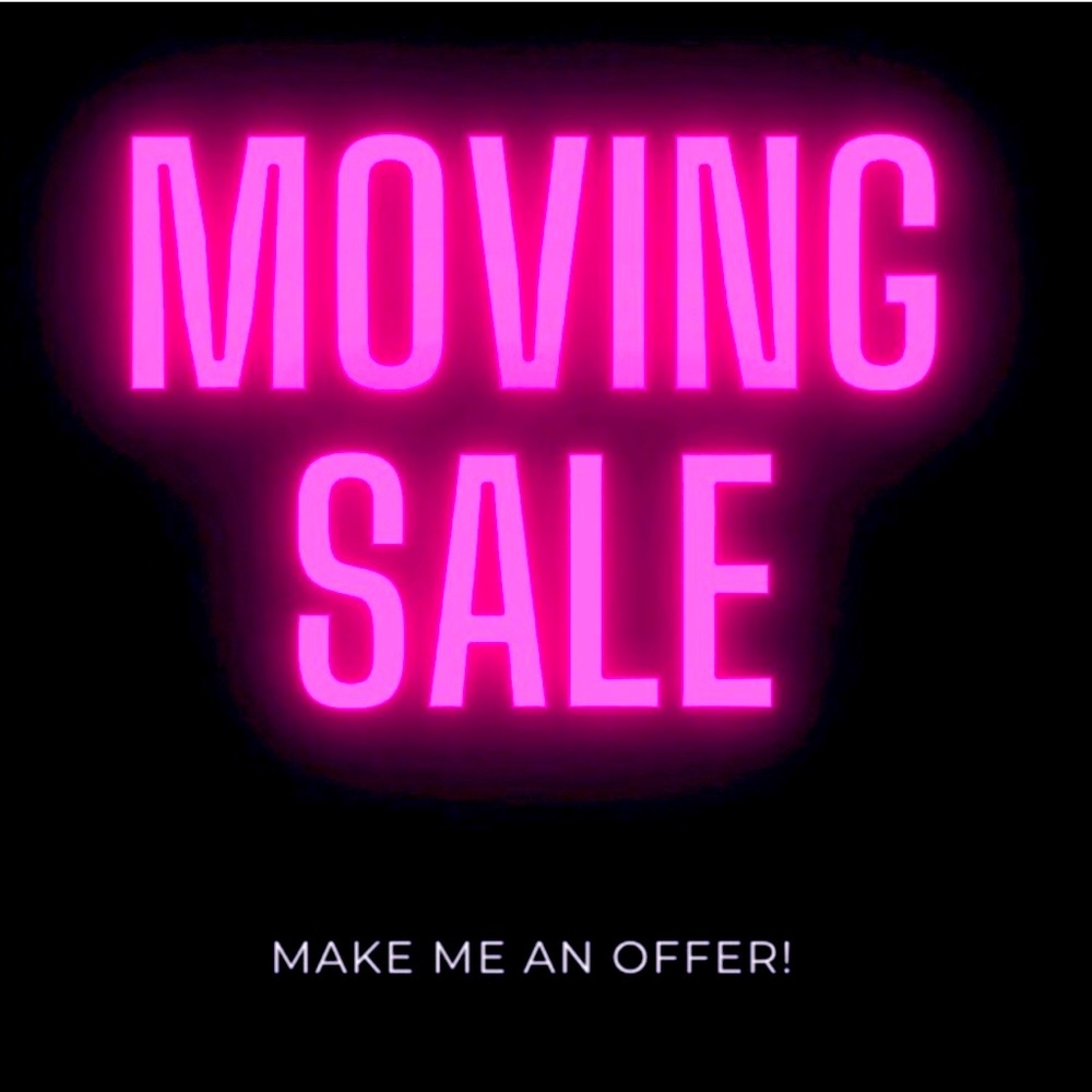 Moving sale. Box filled with skincare, makeup, and clothes.